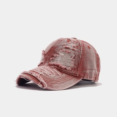 Washed and distressed denim baseball cap