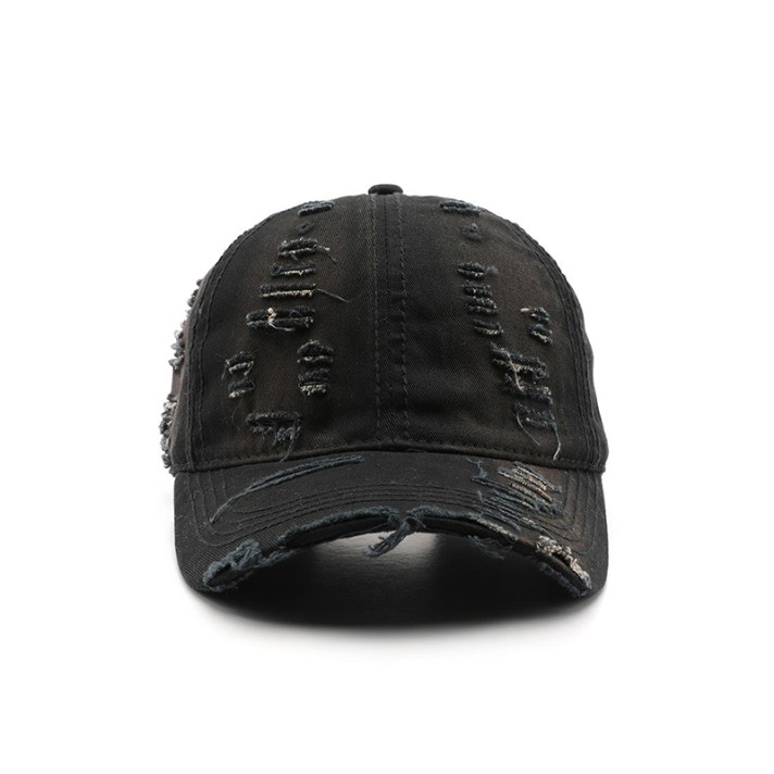 Torn distressed washed baseball cap Torn distressed washed baseball cap