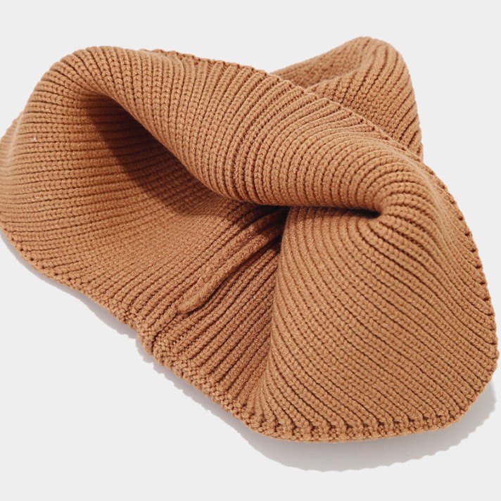 Simple dome-shaped knitted hat with ear flaps Simple dome-shaped knitted hat with ear flaps