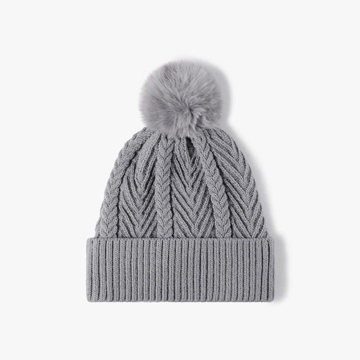 Stylish and comfortable pom-pom knitted hat Stylish and comfortable pom-pom knitted hat