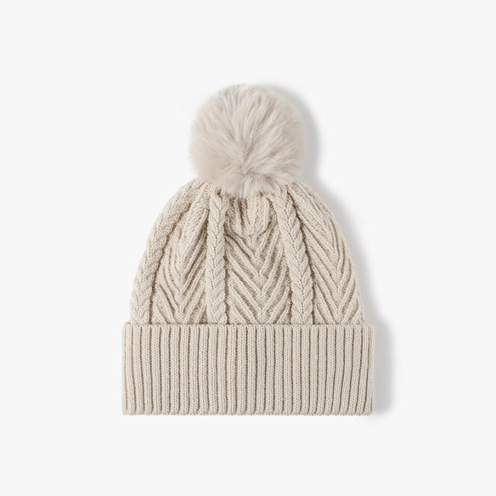 Stylish and comfortable pom-pom knitted hat Stylish and comfortable pom-pom knitted hat